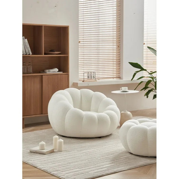 Sillón decorativo tapizado en tela 3D con otomana